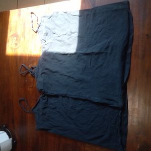 Two black tank tops